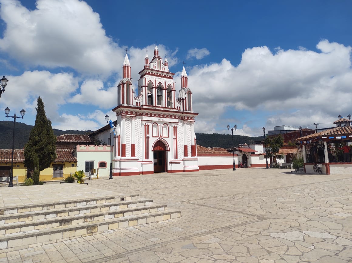 Elderly man weaving in traditional workshop
